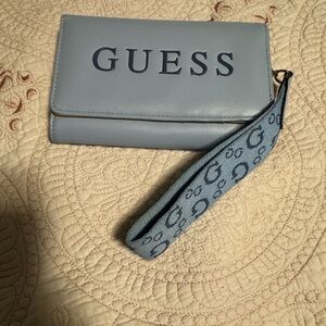 GUESS Light Blue Logo Wristlet with Patterned Strap